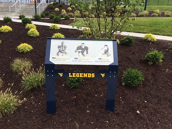 A plaque dedicated to Mountaineer Legends Society members Paul Bischoff, Chuck Howley and Sam Huff in the Legends Park area located on the north end of Mountaineer Field.