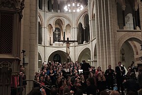 Premiere of Laudato si' on 6 November 2016 at the Limburg Cathedral, conducted by the composer Limburger Dom Oratorium Laudato si 06112016 (cropped) 1.jpg