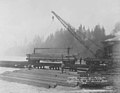 Loading timbers with a crane, Puget Mill Co, Port Gamble, Washington, 1918 (INDOCC 1318).jpg