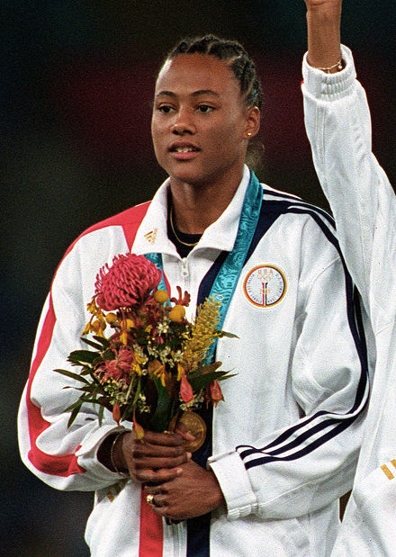 Marion Jones was stripped of three sprint medals for doping at the 2001 event