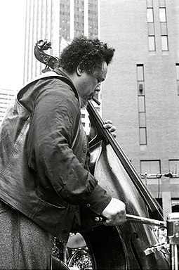Jazz bassist Charles Mingus was also an influential bandleader and composer whose musical interests spanned from bebop to free jazz. Minugs 1976.jpg