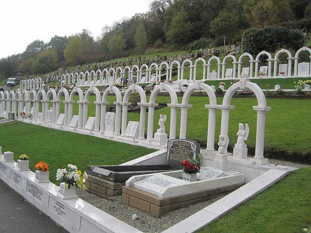 White arches in Bryntaf Cemetery, Aberfan, mark the graves of the children killed in the disaster