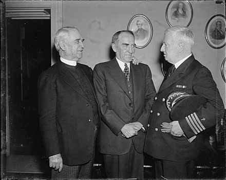 House Chaplain James Shera Montgomery and Speaker William Bankhead welcome Navy Chief of Chaplains Edward A. Duff, the first Navy chaplain in 117 years (since 1820) to open a House session as guest chaplain, March 25, 1937