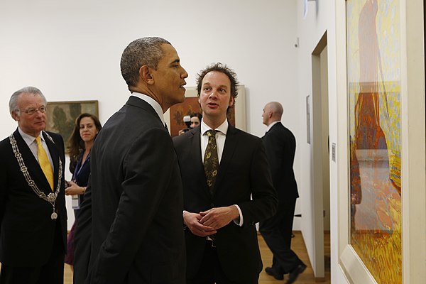 Mayor of the Hague Jozias van Aartsen, Director Benno Tempel and President of the United States Barack Obama during a visit at the Gemeentemuseum Den 