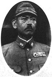 photo en noir et blanc d'un militaire portant la moustache.