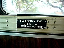 Operation guide metal plate for emergency exits installed in the school bus window. Operation guide metal plate for emergency exits installed in the school bus window.jpg