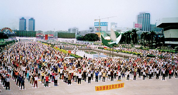 Practitioners of Falun Gong perform spiritual exercises in Guangzhou, China.