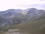 ]] des del coll del la Marrana (Ripollès) (Queralbs). Pirineus. This is a a photo of an emblematic summit in Catalonia, Spain, with id: CE-290076006 Object location 42° 25′ 26.11″ N, 2° 12′ 49.81″ E  View all coordinates using: OpenStreetMap