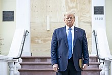 President Trump at the door of Ashburton House, St. John's Church Parish House, June 1 President Trump Visits St. John's Episcopal Church (49964152976).jpg