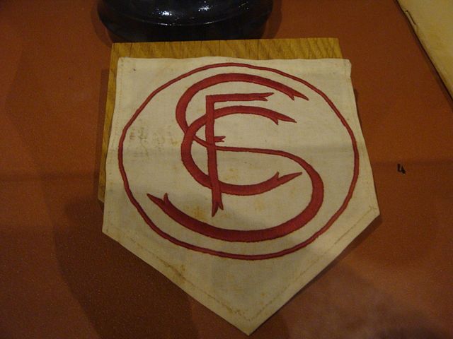 Sevilla's first crest, displayed on a former player's shirt in the club museum