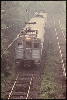 Penn Central operated Silverliner II outbound at Chelten Avenue in 1974. SOUTHEASTERN PENNSYLVANIA TRANSPORTATION AUTHORITY (SEPTA) TRAIN ENROUTE TO NORTH PHILADELPHIA. THE SYSTEM... - NARA - 556759.jpg