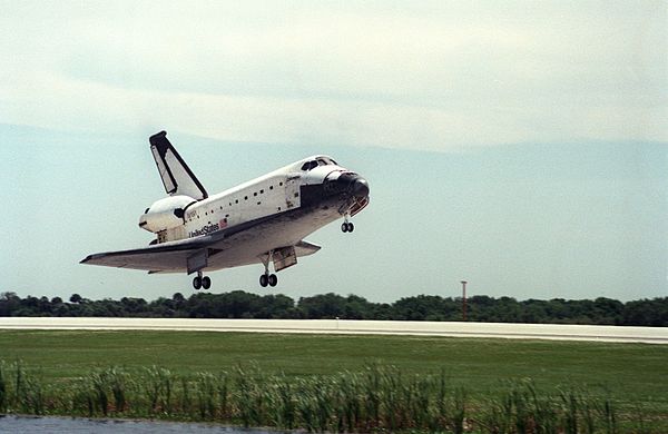 Columbia lands at Kennedy, following an abort of the mission due to a fuel cell malfunction