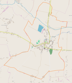 Mapa konturowa Skalbmierza, blisko centrum na prawo znajduje się punkt z opisem „Kościół św. Jana Chrzciciela”