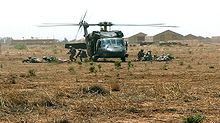 Iraq 2007 Soldiers exit a UH-60 Black Hawk helicopter 2007-06-05.jpg