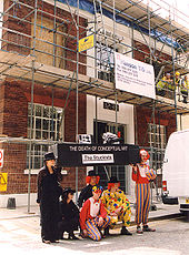 Stuckist artists demonstrate outside White Cube Hoxton, July 2002. The scaffolding was in place to add extra floors. Stuckists Death of Conceptual Art demo (2).jpg