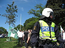 Police, like this Swedish police officer in riot gear at a 2007 demonstration, may use pepper spray to control civilians. Swedish riot police at nationalist demo.jpg