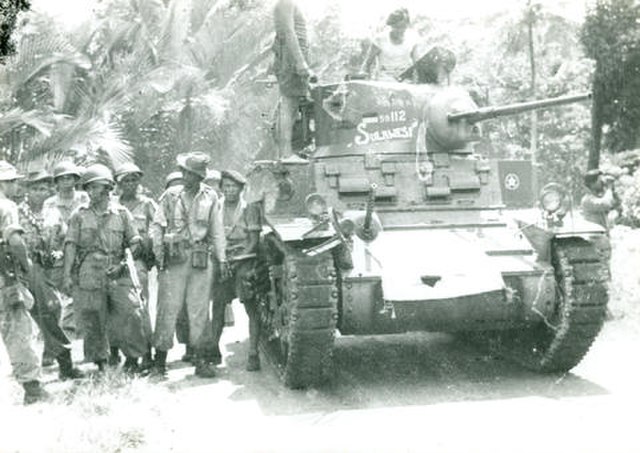 Indonesian army M3 Stuart tank patroling in Ambon during Republic of South Maluku rebellion, 1950