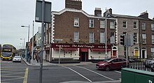 The Auld Triangle bar on Dorset Street. This pub is notable for having art on its outside walls paying homage to Irish Republican Hunger Strikers from the second half of the 20th century The Auld Triangle Inn.jpg