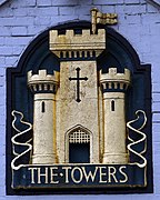 The Towers pub sign front of pub