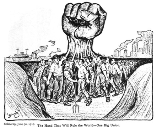 A raised fist in solidarity of the worker movement