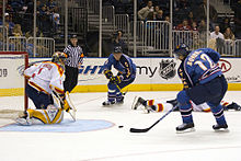 Thrashers players on the attack against the Florida Panthers. Thrashers Bondra shoot.jpg