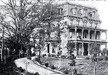 The Treaty Oak (left) and Oak Lawn mansion (right) in 1900. Treaty Oak and Oak Lawn - Washington, D.C.jpg