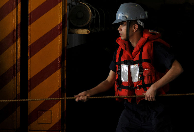 File:US Navy 120126-N-UT411-063 A Sailor brings in the messenger line during a replenishment at sea with the Military Sealift Command fast combat suppo.jpg