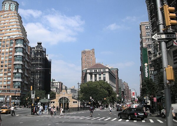 Looking northward on Broadway toward 72nd Street in Verdi Square, New York City. The New York City Subway's 72nd Street station house can be seen at left.