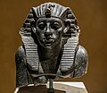 Upper part of portrait statue of pharaoh Amenemhat III from Koptos 01