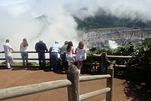 Tourists at the viewing area at the edge of the Poas Volcano crater. Viewing area Poas volcano 6651 CRI 08 2009.jpg