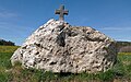 Wayside cross on a stone ‎