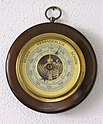 Aneroid barometer for household use from c. 1925 Wohnzimmerbarometer.jpg