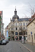 Residential and commercial building in a corner