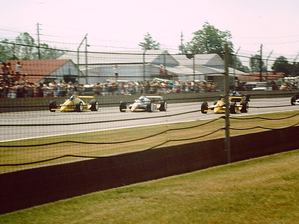 The front row during the pace lap. From left to right: Al Unser, Sr. (outside), Danny Sullivan (middle), Rick Mears (pole position)