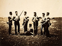 Soldiers of the 68th Regiment in ordinary dress, late April 1855. Henry Sladden, 4th man standing from the left, is wearing his D.C.M. This is possibly the first photograph of this medal. 68th Regimen.jpg