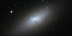 A Peculiar Compact Blue Dwarf Galaxy.jpg