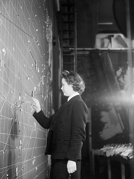 A Women's Royal Naval Service plotter at work in the Operations Room at Derby House in Liverpool, the headquarters of the Commander-in-Chief Western Approaches, September 1944.