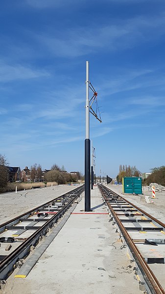 File:Amsteltram rails being laid near Aan de Zoom April 2023.jpg