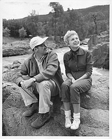 Anthony Mann and Janet Leigh Anthony Mann and Janet Leigh relax between scenes of MGM's 'The Naked Spur', 1952.jpg