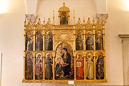 Polyptych Madona s dítětem se svatými: Petrem, Janem Křtitelem, Františkem, Jeronýmem, Donatem (?), Pavlem, Ludvíkem z Toulouse, Dominikem, Klárou, Kateřinou, Antonínem Paduánským (?) a biskupy. Nad nimi vzkříšený Kristus. Podepsáno a datováno rokem 1439. Urbino (Itálie), Národní galerie v Marche, Palazzo Ducale