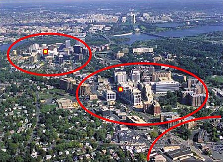 Aerial view of Rosslyn-Ballston corridor in Arlington, Virginia. High density, mixed use development is concentrated within 1/4 - 1/2 mile from the Rosslyn, Court House and Clarendon Washington Metro stations (shown in red), with limited density outside that area. This photograph is taken from the United States Environmental Protection Agency website describing Arlington's award for overall excellence in smart growth in 2002 -- the first ever granted by the agency. ArlingtonTODimage3.jpg