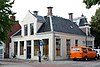 Wit huis met zg. Vlaamse top