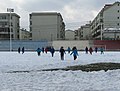 Students at Baotou Foreign Languages School playing soccer in the snow