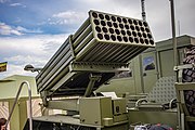 English: MLRS Shkval 122mm. 10th international exhibition of arms and military machinery Milex-2021 (23-26 June 2021). Minsk, Belarus Русский: РСЗО Шквал 122мм. 10-я международная выставка вооружения и военной техники Milex-2021 (23-26 июня 2021). Минск, Беларусь