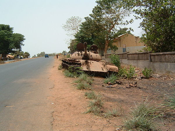 An abandoned T-55 from the civil war in Bissau, 2003