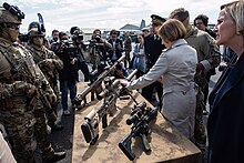 French Minister of Armed Forces, Florence Parly, examines a Cadex CDX-40 during a visit to the French Army Special Forces Command's units in Pau (2019) Cadex CDX-40.jpg