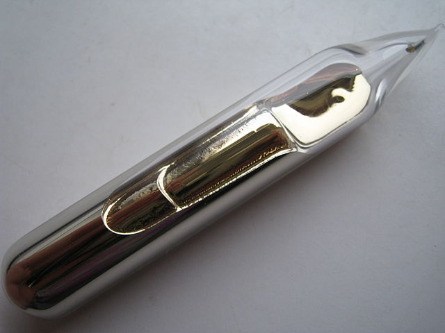 Caesium metal in a glass ampoule