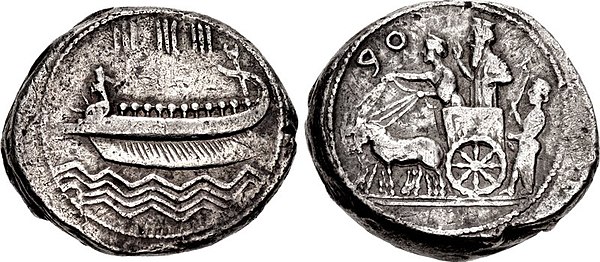 Achaemenid-era coin of Abdashtart I of Sidon, who is seen at the back of the chariot, behind the Persian King.