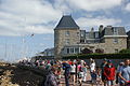 The Royal Yacht Squadron, Cowes, Isle of Wight, seen during Cowes Week 2011. It is busy with people watching yachts racing.