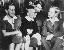 Eleanor Roosevelt with her grandchildren; Anna Eleanor Dall, John Roosevelt Boettiger, and Curtis Roosevelt, 1943